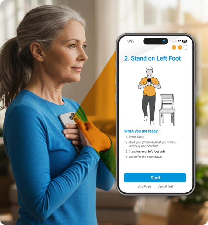 Woman holding a smartphone against her chest to take a balance test, beside the app screen showing the Stand on Left Foot step and its instructions