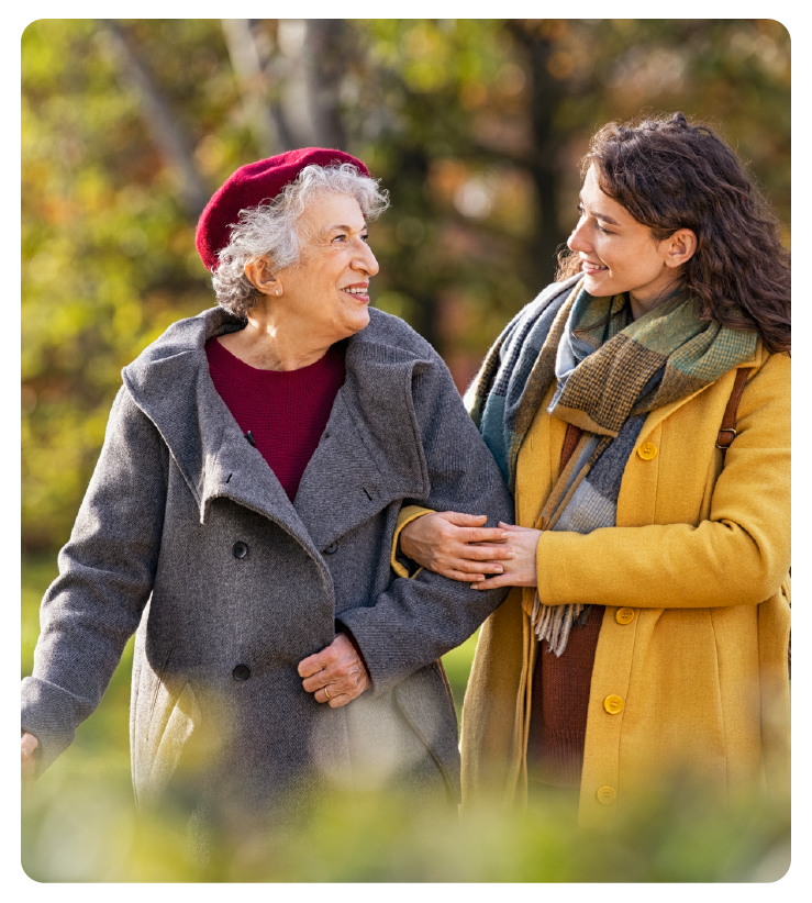 Two women walking together outdoors to represent mobility and balance confidence